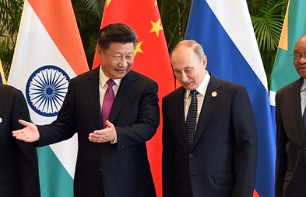  PUTIN IN CINA PER IL VERTICE CON XI E MODI
